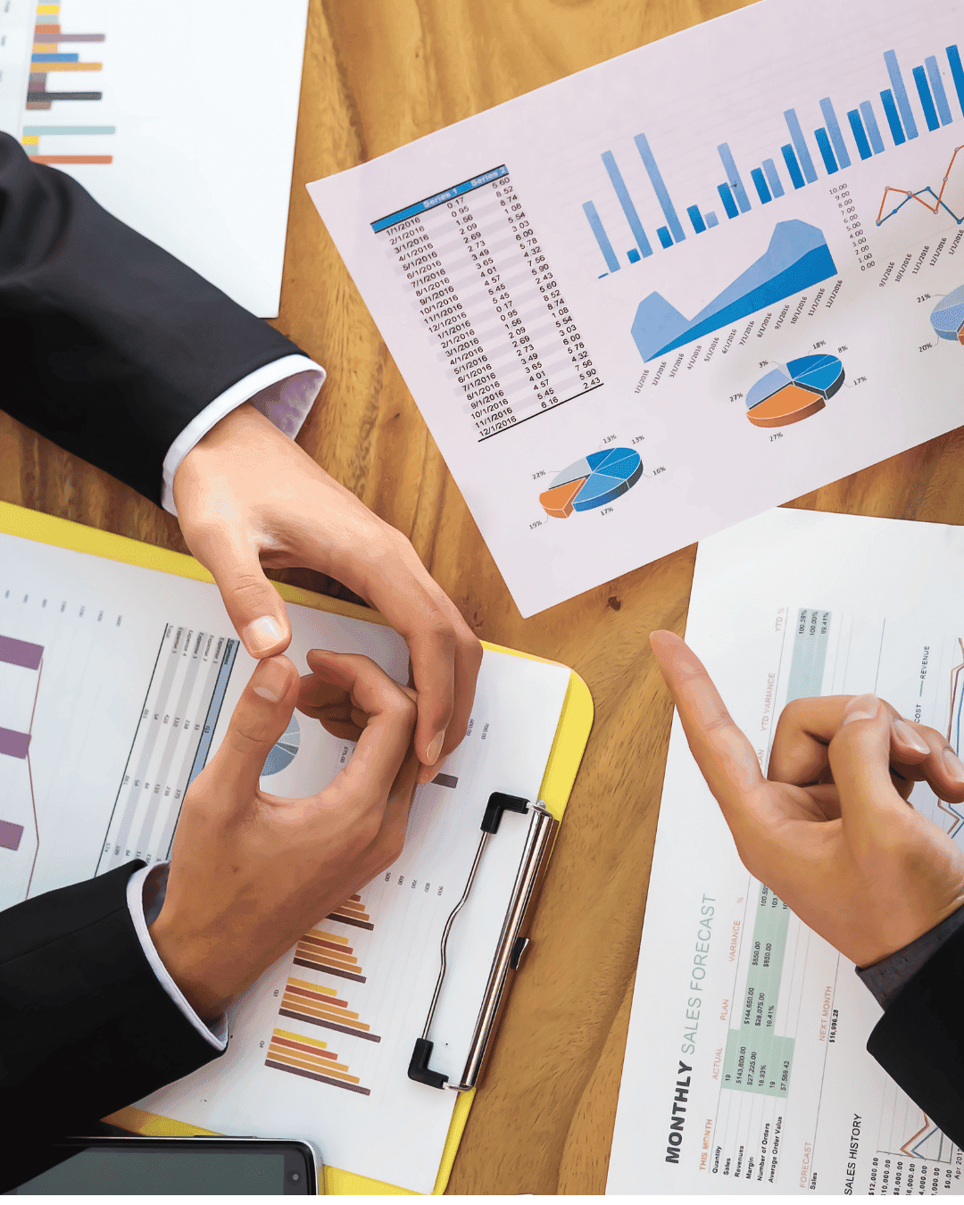 Business consultation session with charts and reports