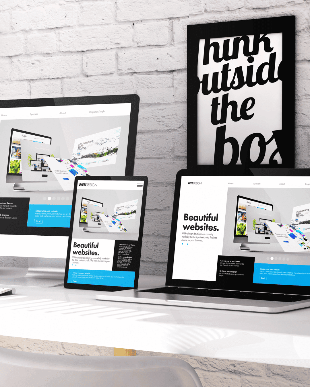 Website design preview on desktop and laptop screens